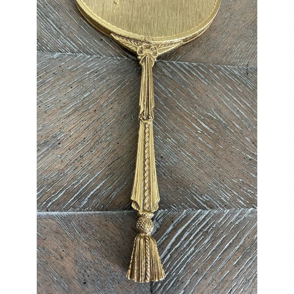 Vtg Matson Stylebuilt Hand Held Mirror Gold Tone Rose and Rope Tassel Design